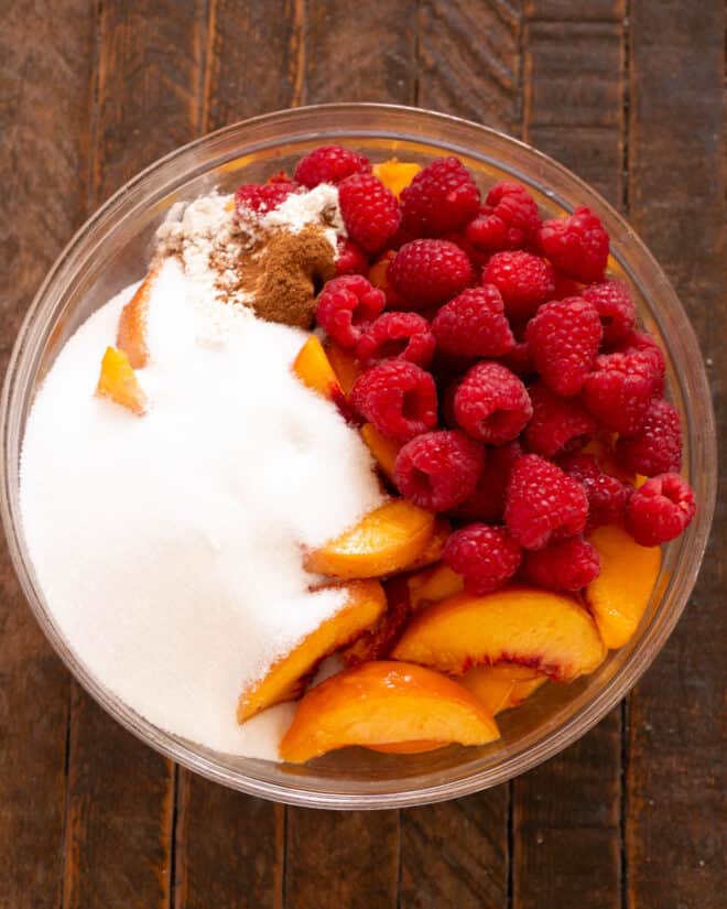 Collage of process shots for peach raspberry crisp.