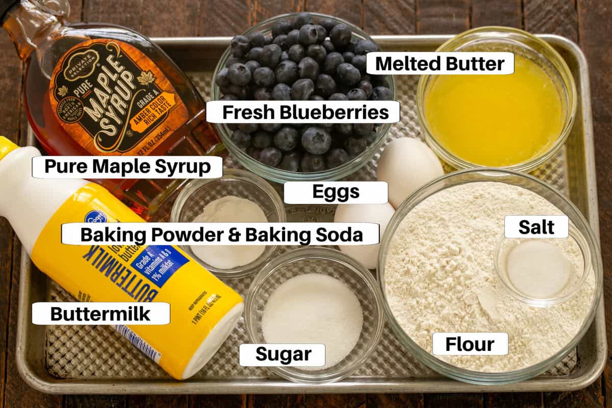 Pancake ingredients on a metal sheetpan with labels.