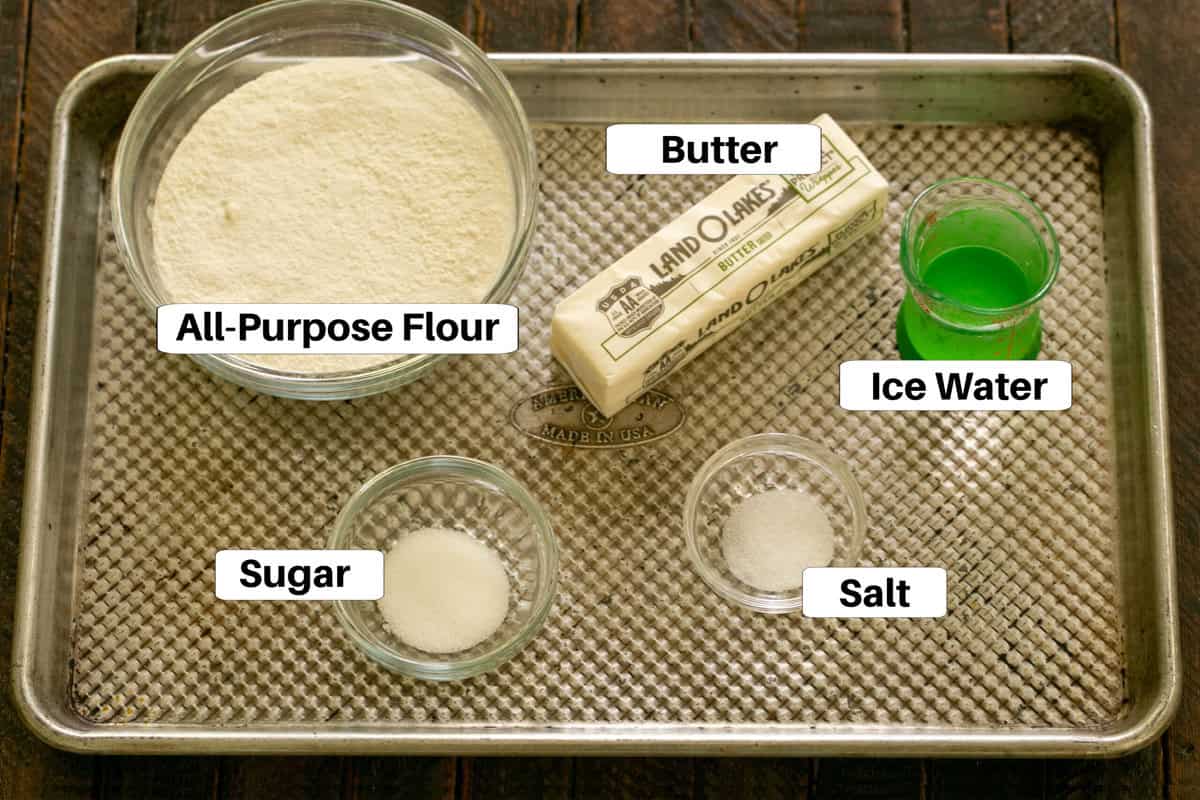 Peach Galette Crust Ingredients on a Sheetpan with labels.